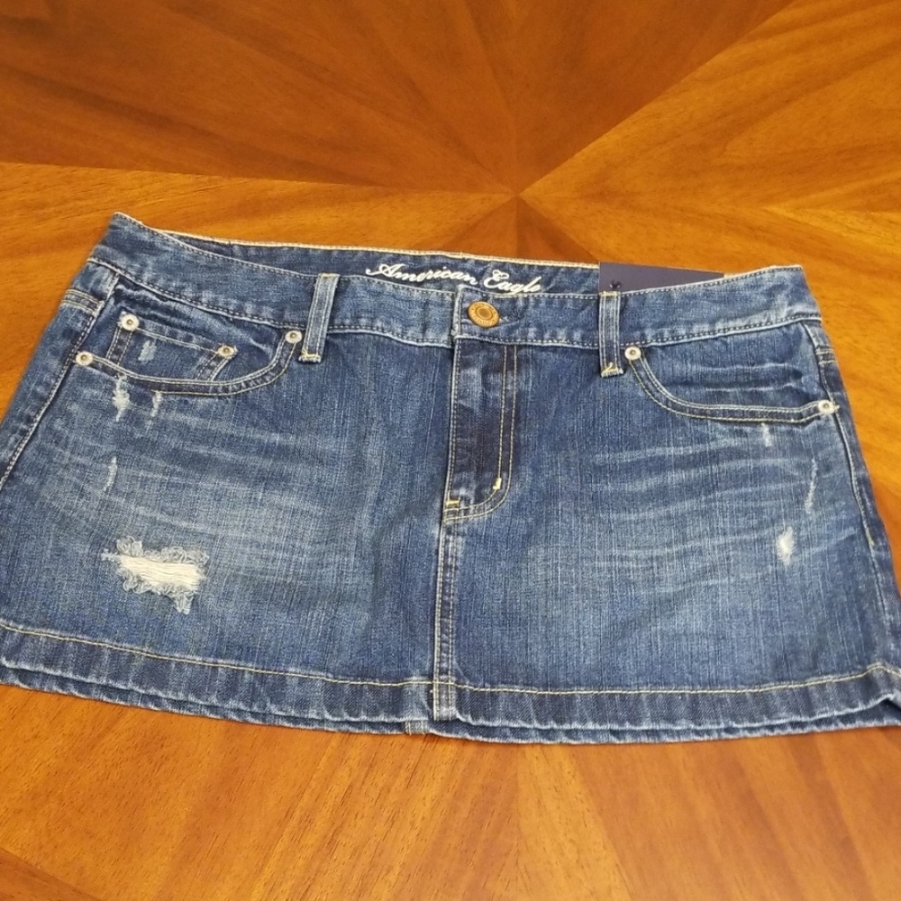 American Eagle denim mini skirt distressed M216